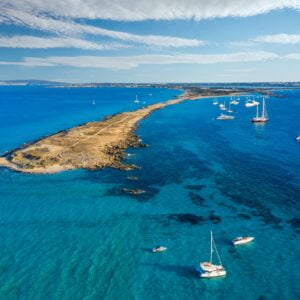 Aerial view over the clear beach and turquoise water of Formentera, Ibiza