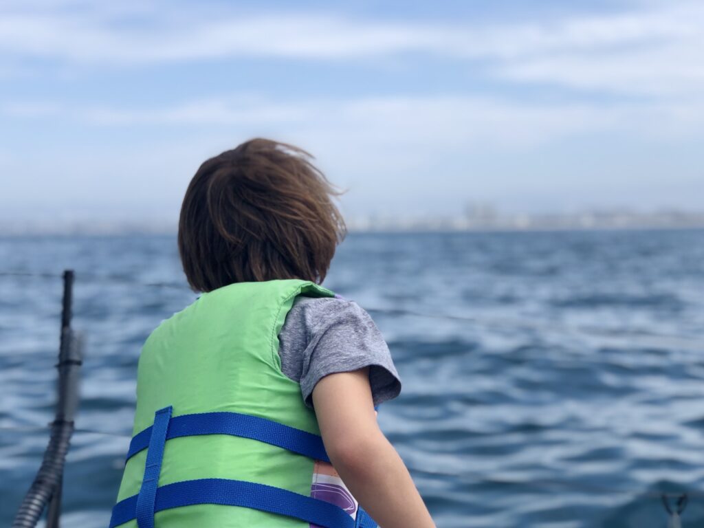 Boy on sailing boat